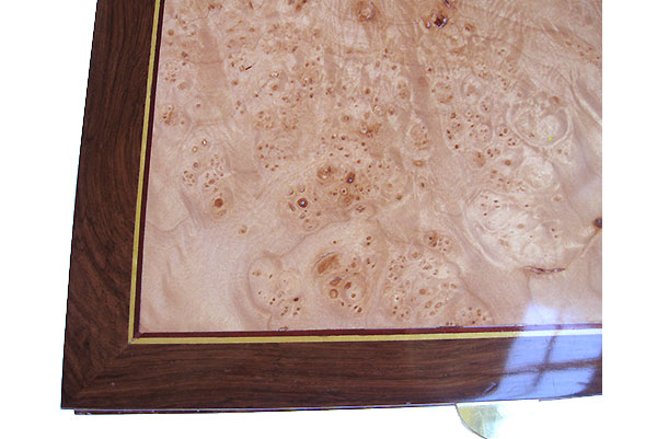 Maple burl center framed in Madagascar rosewood box top close up