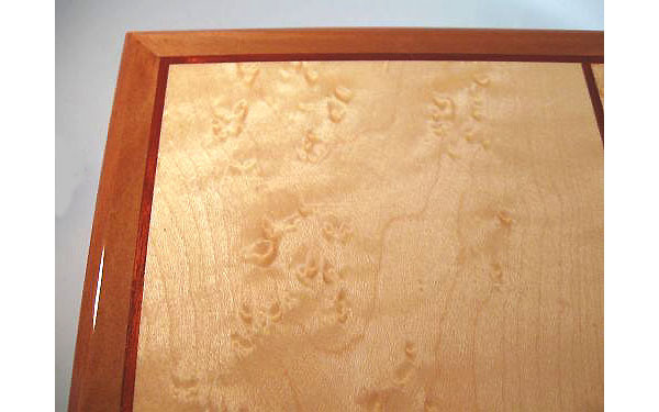 Men's valet box handcrafted from pearwood with birds eye maple top - Close up view